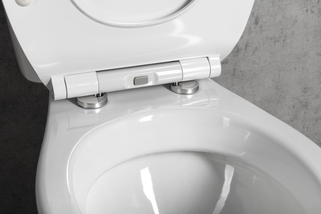 Aqualine MANUEL WC kombi, dvojtlačítko 3/6l, spodní odpad, bílá, detail pantů sedátka